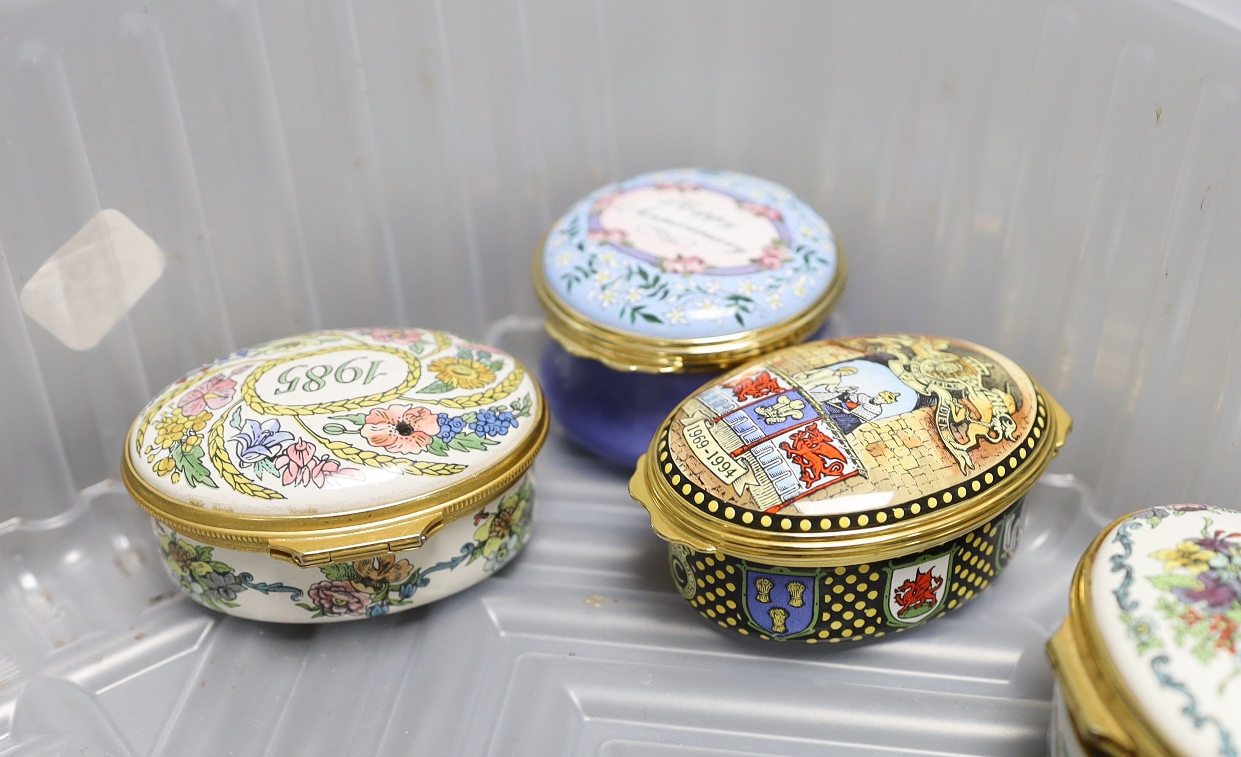 A collection of thirteen enamel boxes, mostly Halcyon Days.